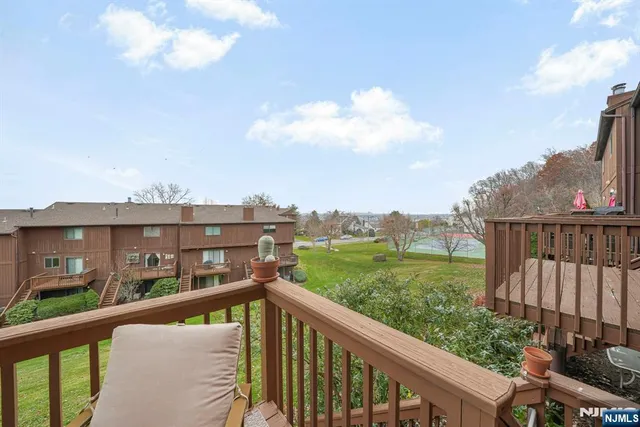 a view of a balcony with an outdoor space