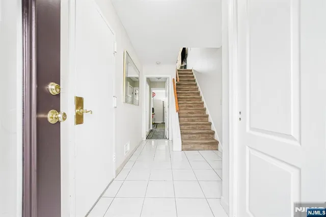 a view of a hallway with entryway