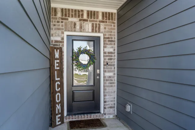 a hallway with painting and a decor