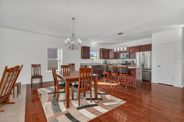 a view of a dining room with furniture