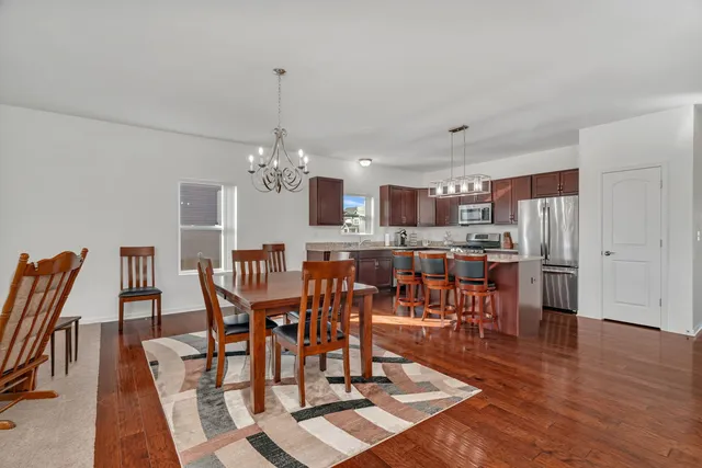 a view of a dining room with furniture