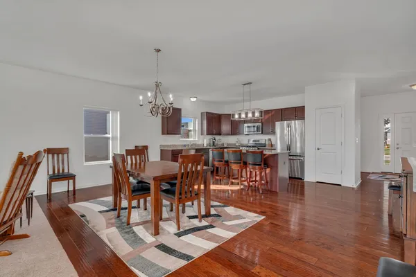 a view of a dining room with furniture