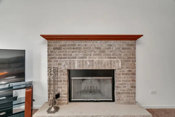 a fireplace with a fireplace in front of it