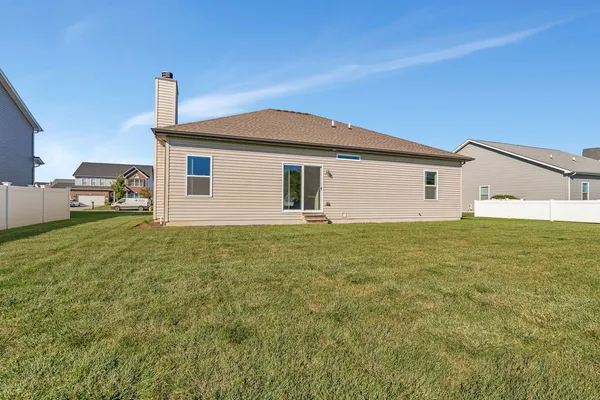 a front view of house with yard