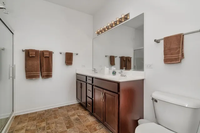 a bathroom with a sink and mirror