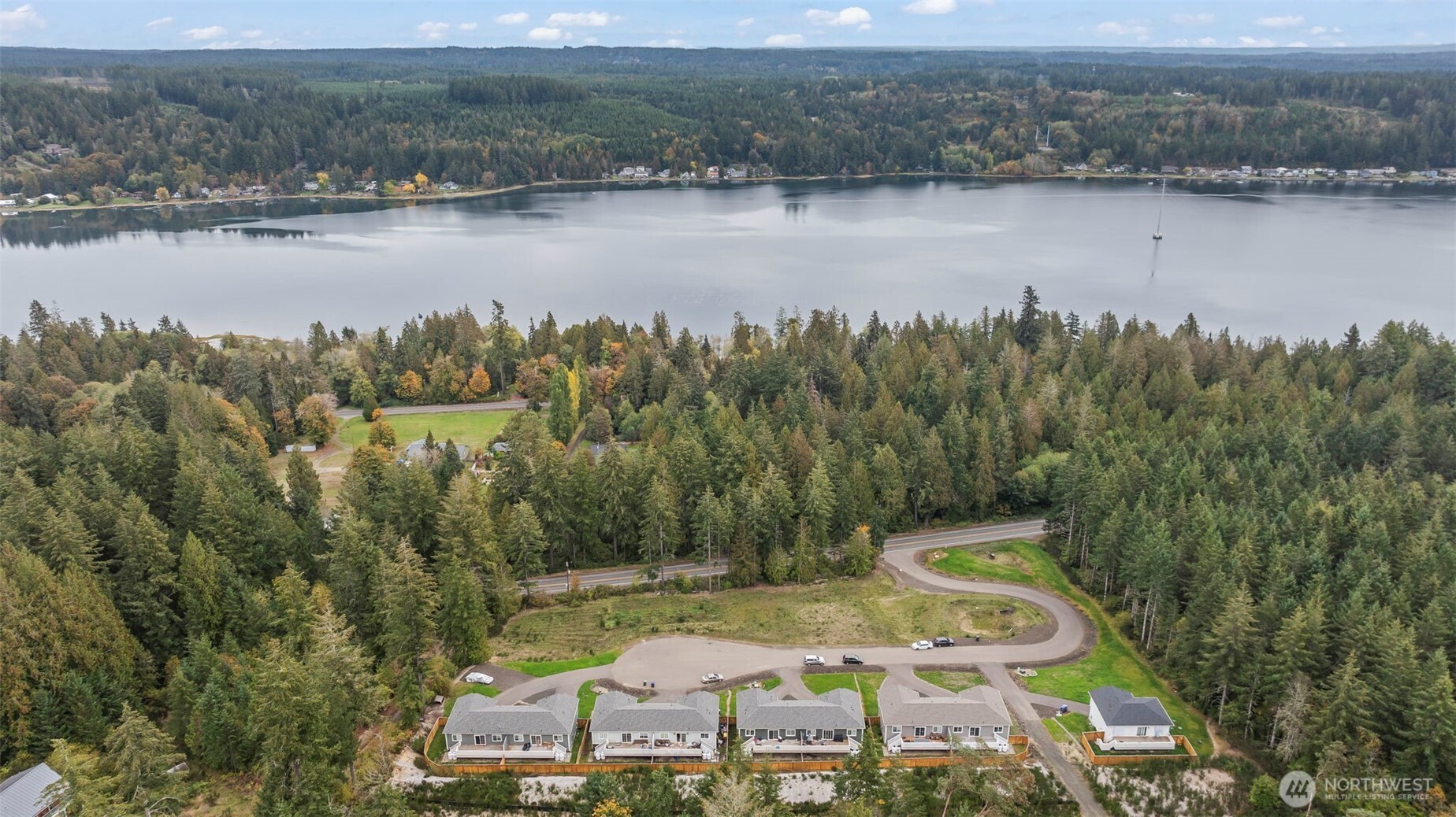 19013 Highway 3, Unit B Allyn, WA 98524 - Photo 22 of 22 a view of a lake with a mountain view