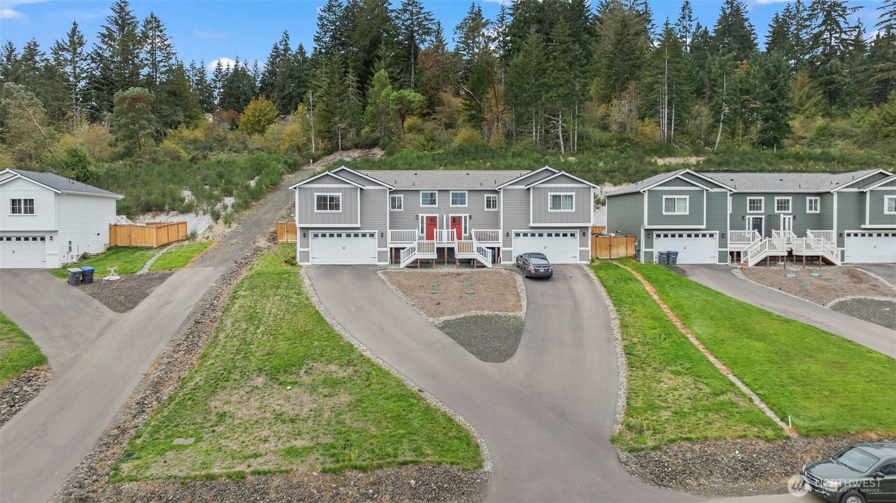 19013 Highway 3, Unit B Allyn, WA 98524 - Photo 3 of 22 an aerial view of a house with swimming pool and garden