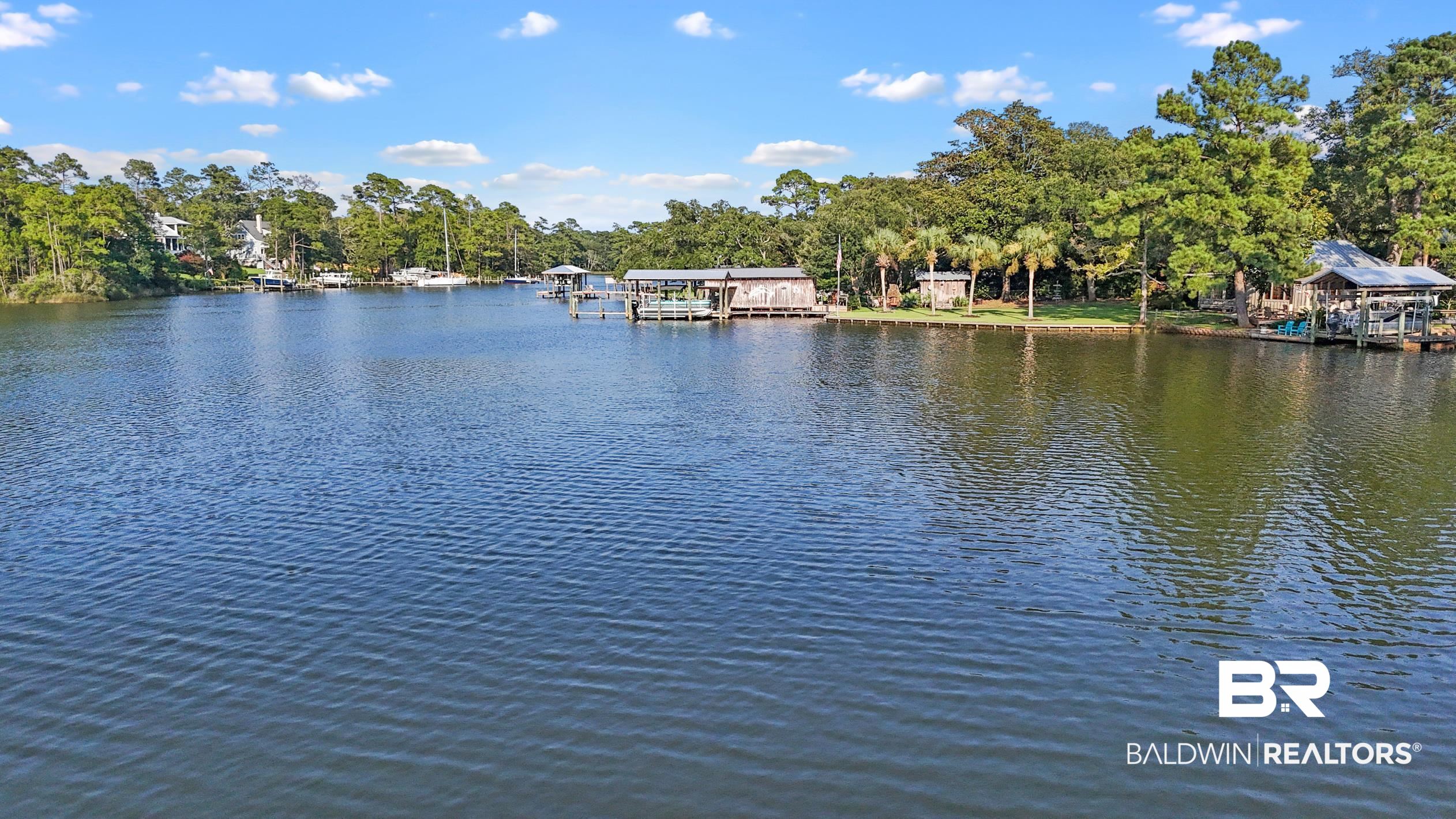 4 South Bayou Drive Elberta, AL 36530 - Photo 5 of 12 View of water feature with a dock