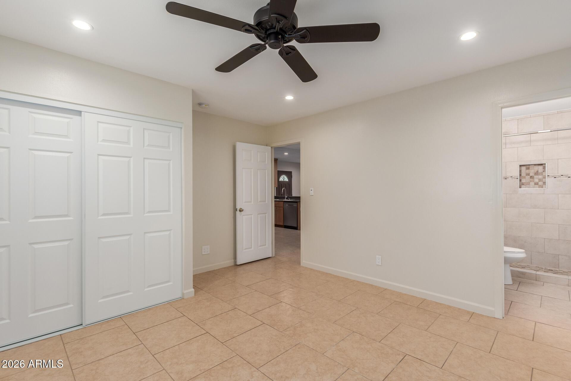 1628 East Del Rio Drive Tempe, AZ 85282 - Photo 22 of 32 wooden floor in an empty room and a ceiling fan