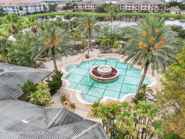 a view of a chairs and table in a patio