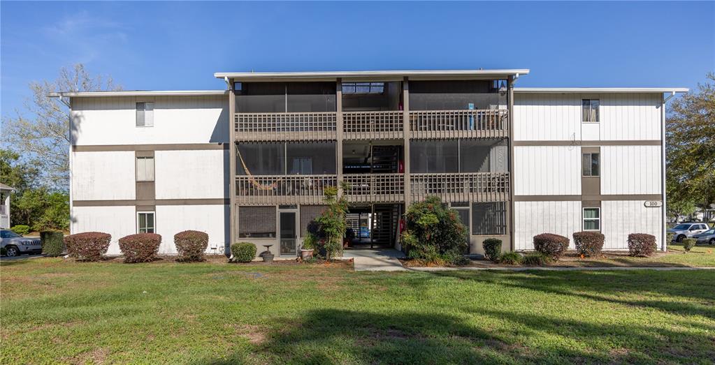 6519 West Newberry Road, Unit 109 Gainesville, FL 32605 - Photo 1 of 21 a view of a backyard with garden