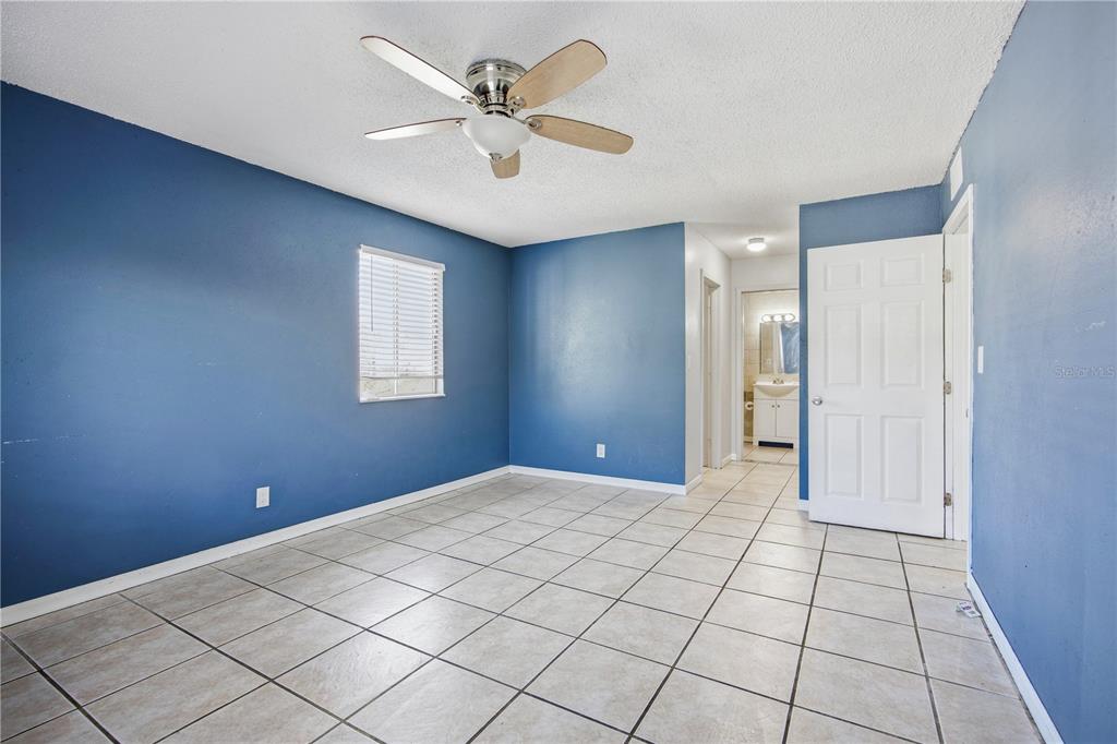 6519 West Newberry Road, Unit 109 Gainesville, FL 32605 - Photo 12 of 21 a view of an empty room and window