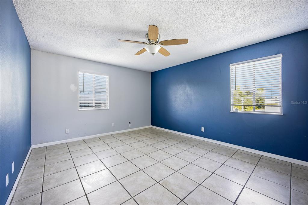 6519 West Newberry Road, Unit 109 Gainesville, FL 32605 - Photo 13 of 21 a view of an empty room with a window