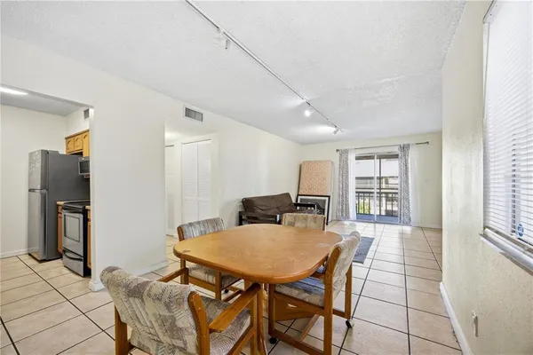 a view of a dining room with furniture