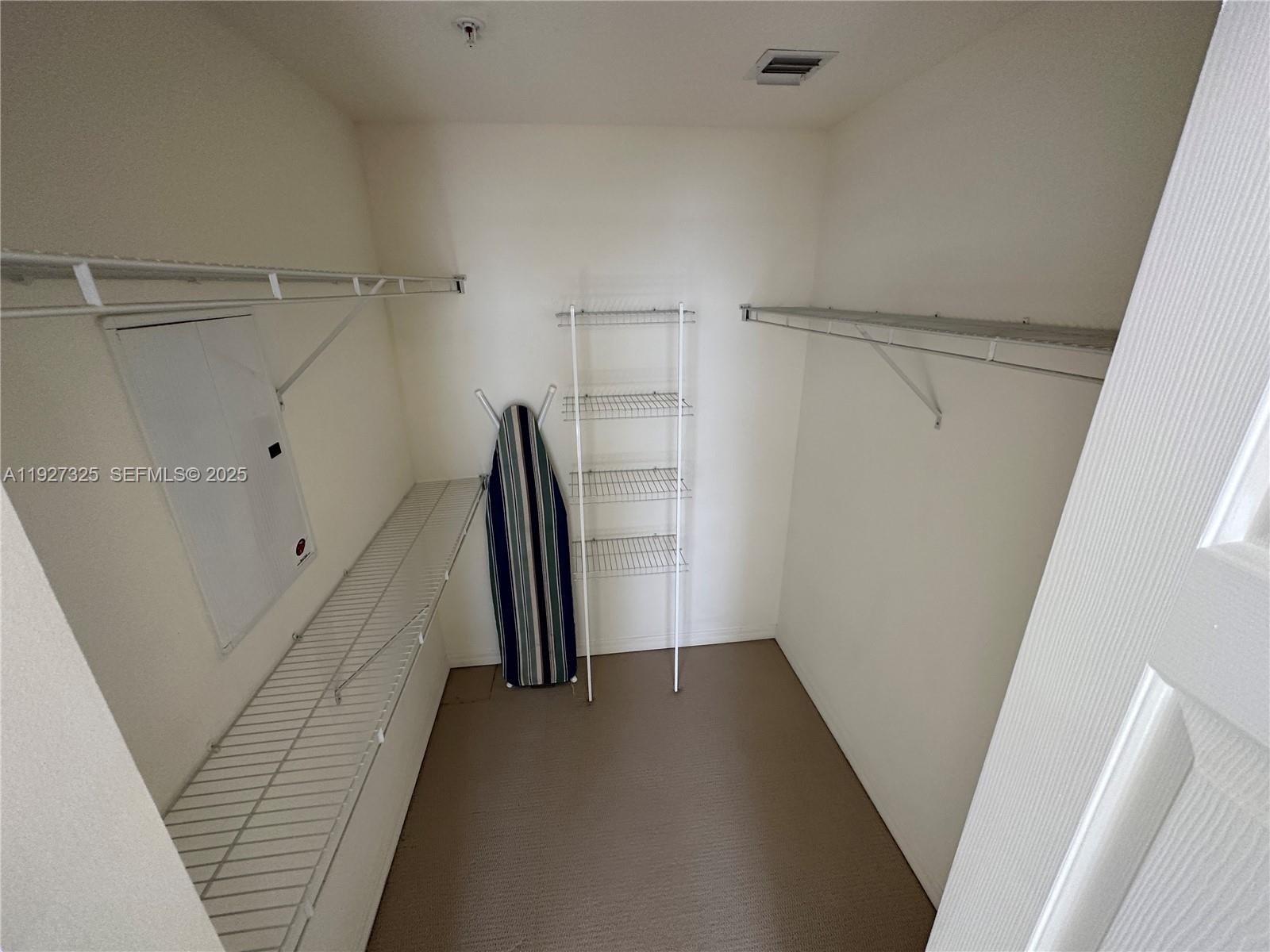 2401 Northeast 65th Street, Unit 606 Fort Lauderdale, FL 33308 - Photo 13 of 19 a view of walk in closet