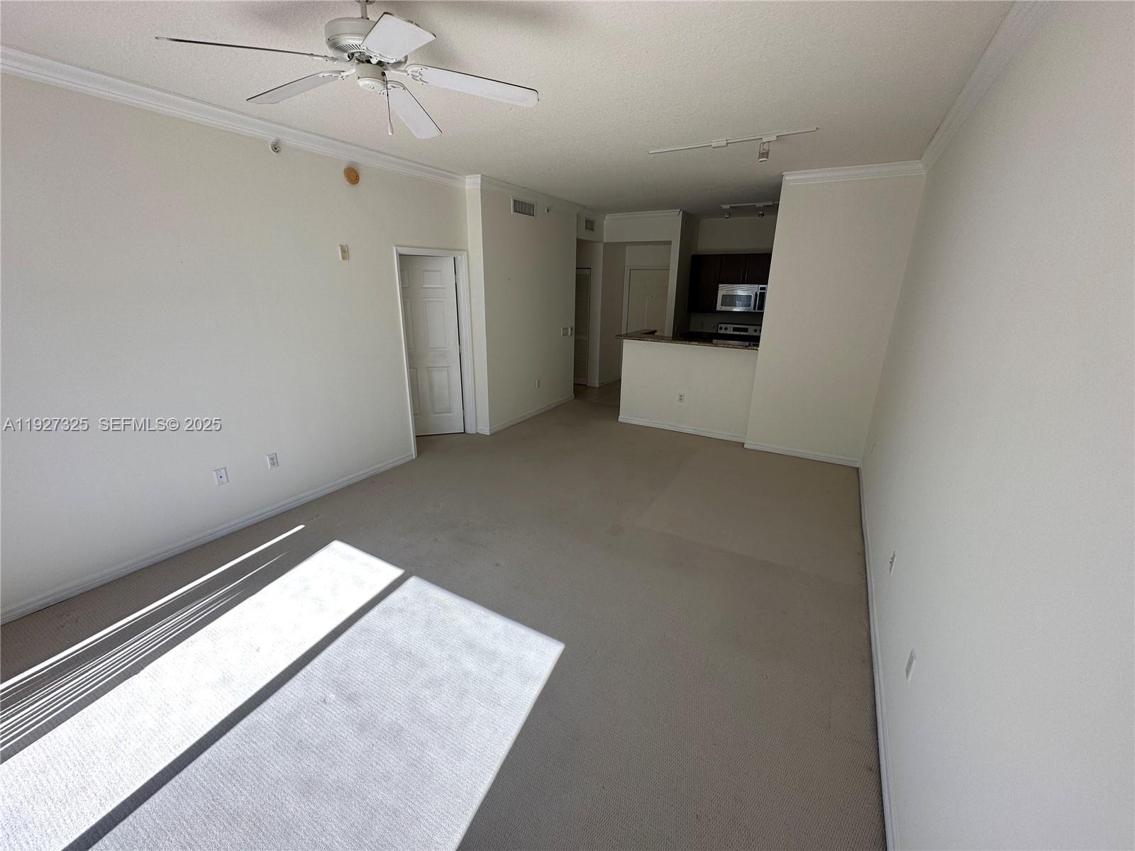 2401 Northeast 65th Street, Unit 606 Fort Lauderdale, FL 33308 - Photo 10 of 19 en empty room with window