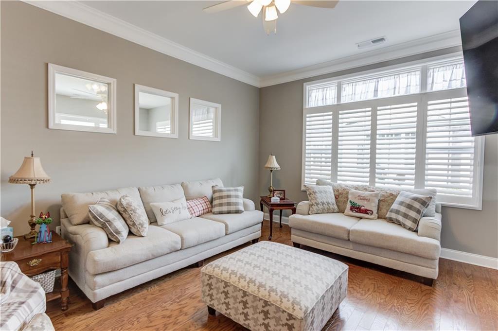 3675 Ridgehurst Drive Buford, GA 30519 - Photo 14 of 43 a living room with furniture and a large window