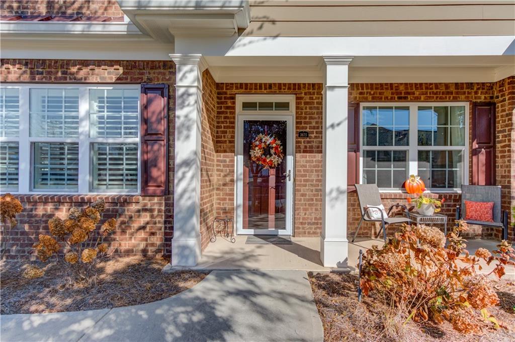 3675 Ridgehurst Drive Buford, GA 30519 - Photo 5 of 43 a front view of a building with glass windows