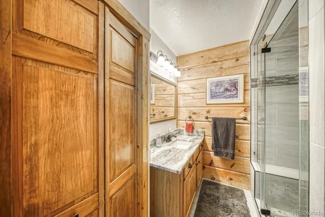 a view of a bathroom with a sink and a bath tub