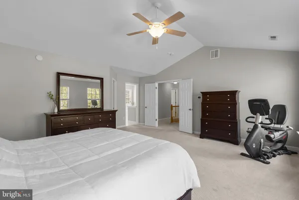 a living room with furniture a couch and a coffee table