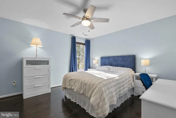 a view of a big room with windows and closet