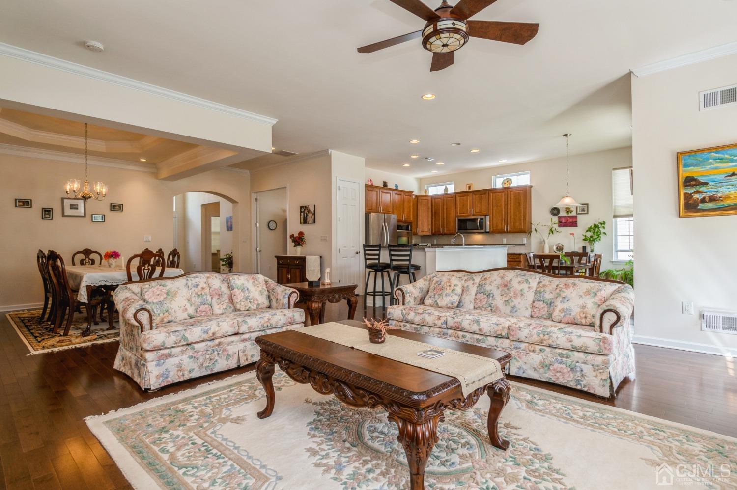 114 Riviera Drive Monroe Township, NJ 08831 - Photo 11 of 40 a living room with furniture kitchen view and a table