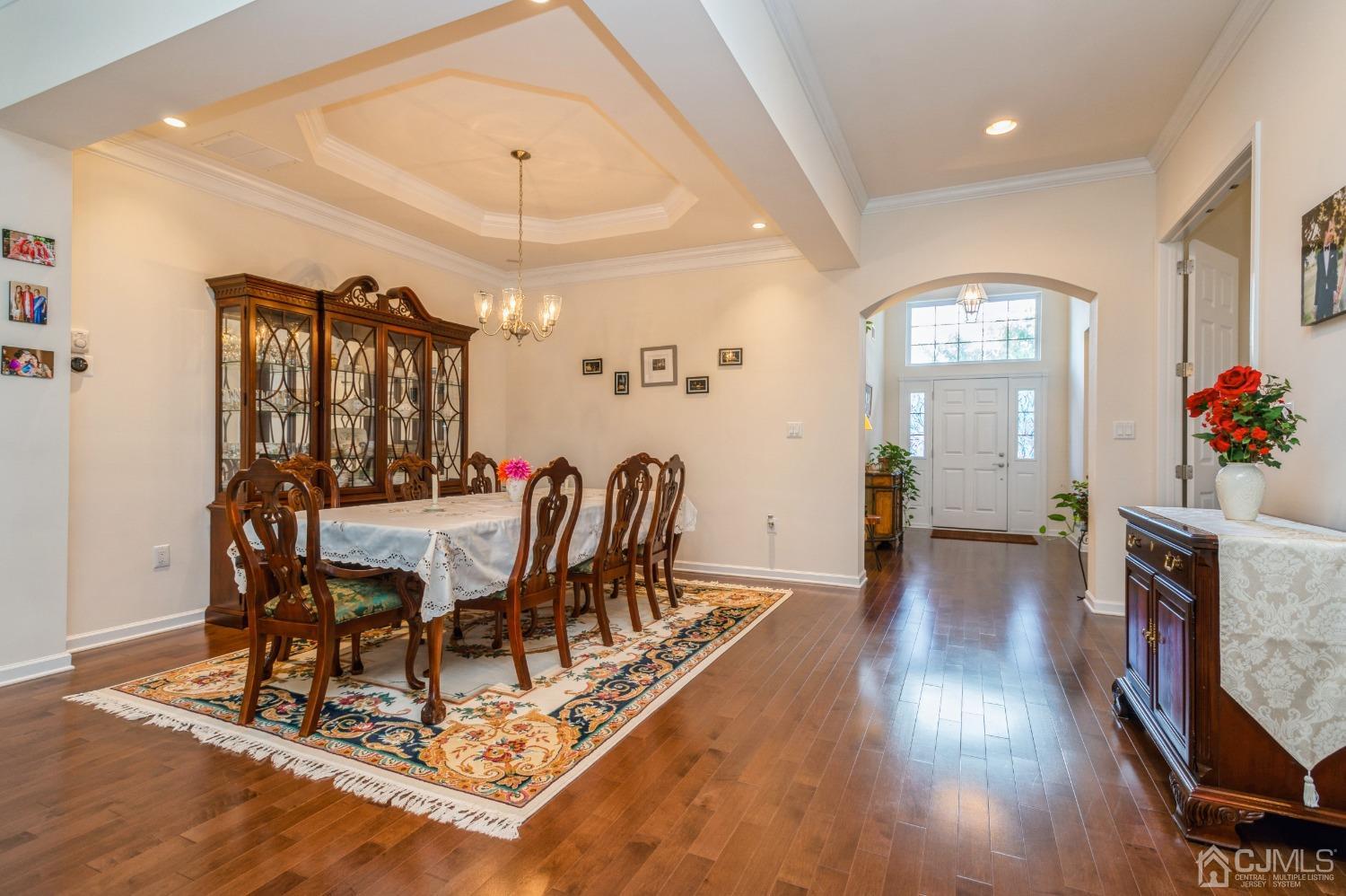 114 Riviera Drive Monroe Township, NJ 08831 - Photo 13 of 40 a view of a dining room with furniture window and wooden floor