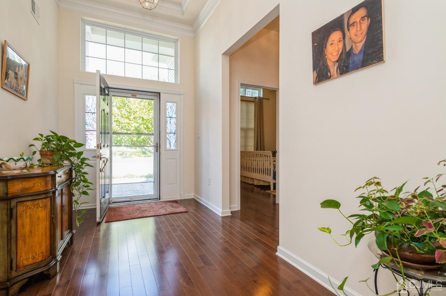 114 Riviera Drive Monroe Township, NJ 08831 - Photo 3 of 40 a view of a entryway with wooden floor