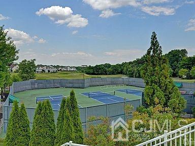 114 Riviera Drive Monroe Township, NJ 08831 - Photo 31 of 40 a view of a swimming pool with a patio