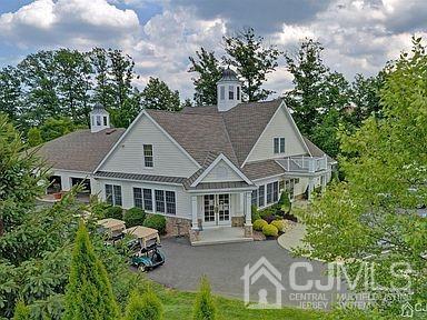 114 Riviera Drive Monroe Township, NJ 08831 - Photo 35 of 40 a aerial view of a house with swimming pool garden and patio