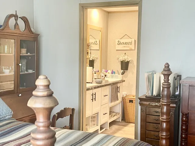 a workspace with furniture and a wooden floor