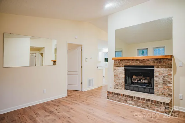 a living room with a fireplace