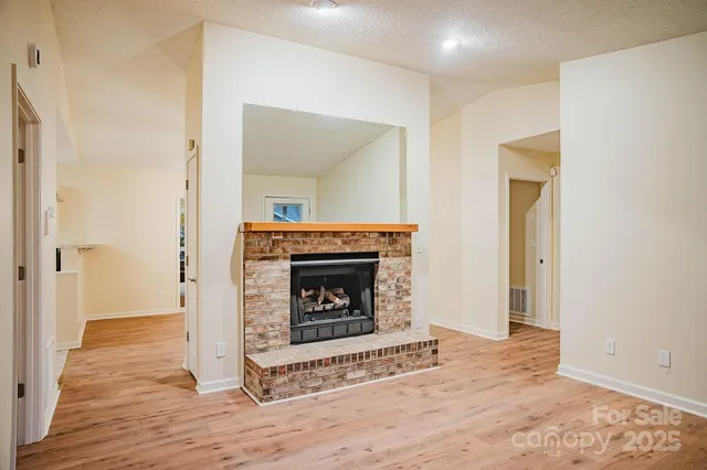 a view of a livingroom with a fireplace