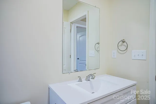 a bathroom with a sink and toilet