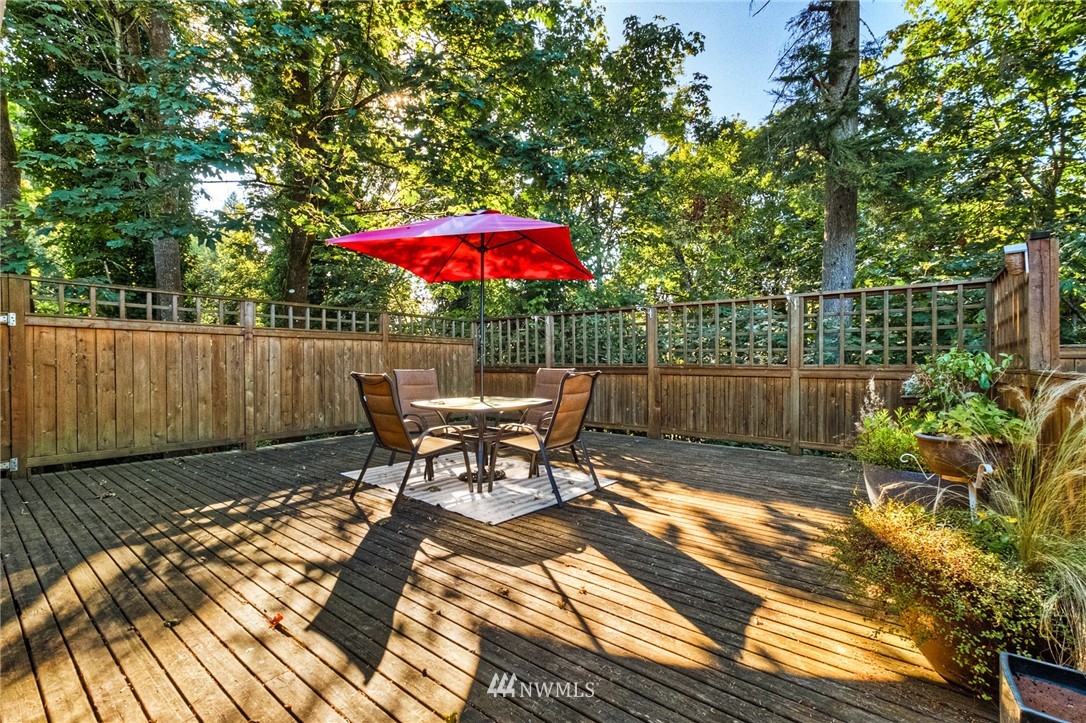 13708 Southeast 141st Street Renton, WA 98059 - Photo 2 of 19 a view of a chairs and table in the patio