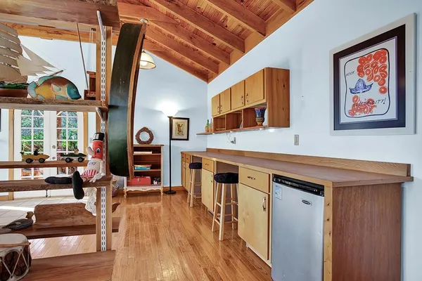 a view of a living room and entry way