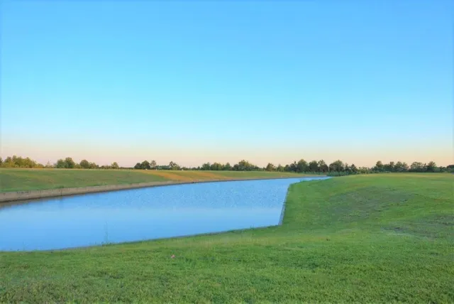 an aerial view of a house with a garden