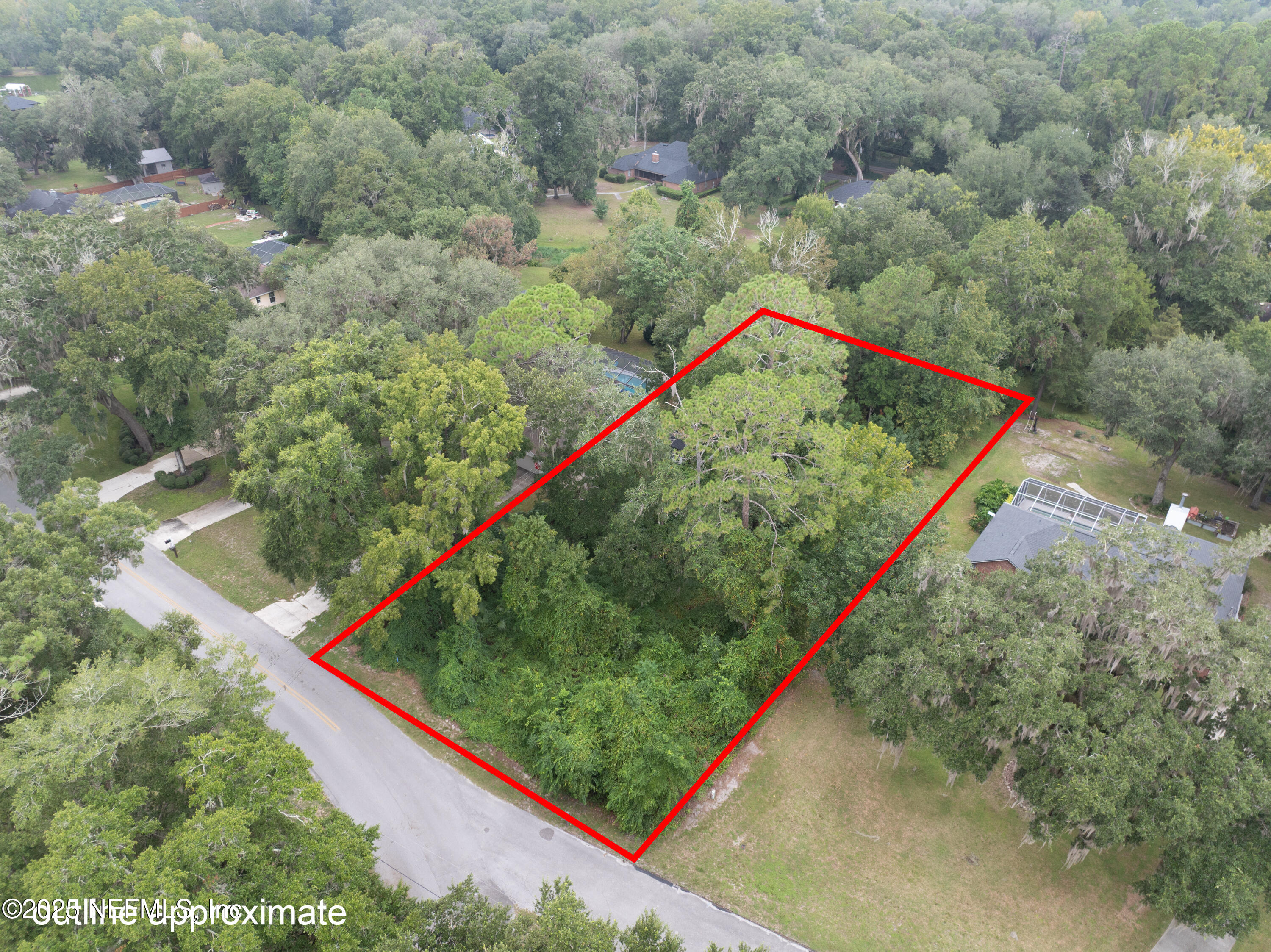 0 Southeast 28th Way Melrose, FL 32666 - Photo 6 of 9 a view of a lush green space with a lake view