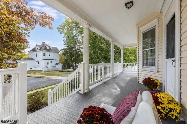 a view of balcony with furniture