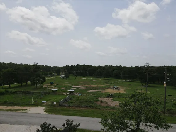 a view of a field with a yard