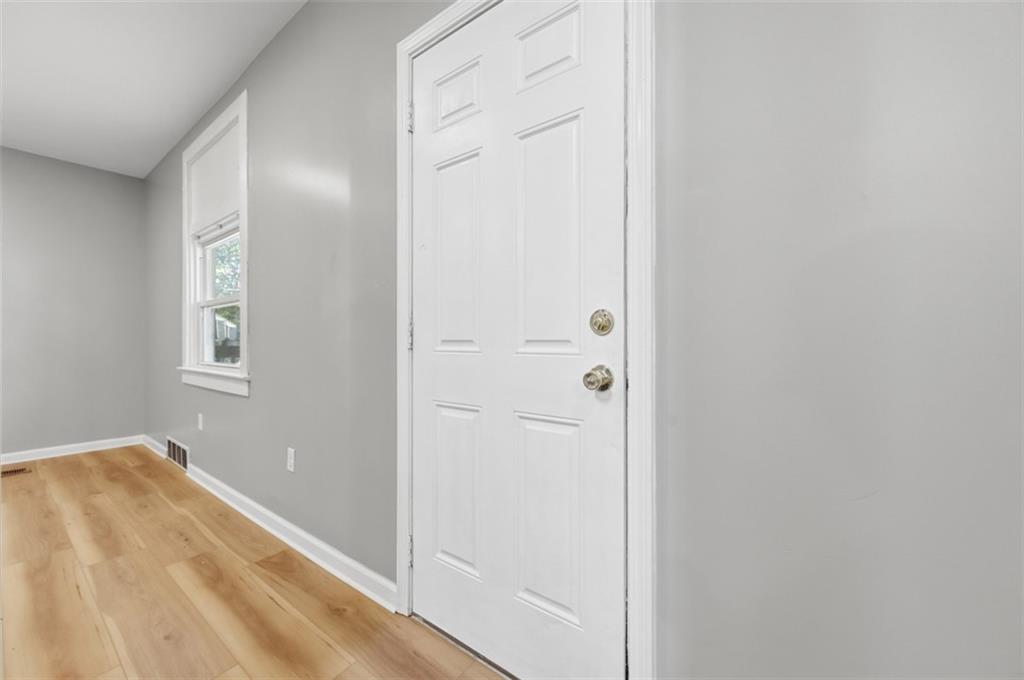 1014 McLaughlin Run Road Bridgeville, PA 15017 - Photo 12 of 25 a view of a bathroom with wooden floor