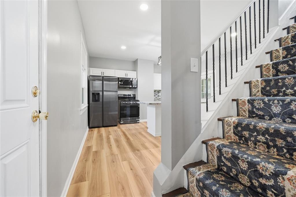 1014 McLaughlin Run Road Bridgeville, PA 15017 - Photo 7 of 25 a view of a kitchen from the hallway