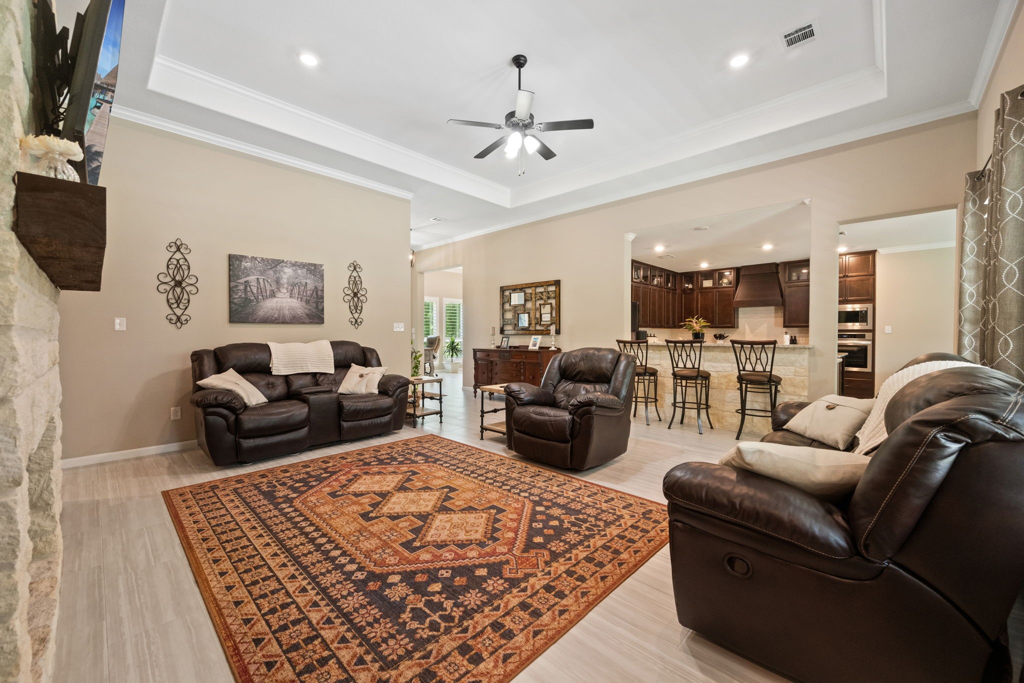 3004 Tyler Street Dayton, TX 77535 - Photo 11 of 34 a living room with furniture ceiling fan and a rug