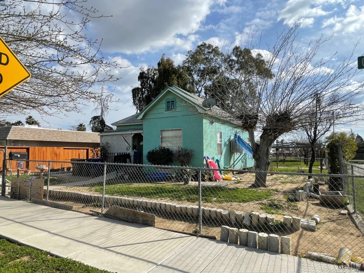 Undisclosed Address Bakersfield, CA 93305 - Photo 2 of 13 a view of a house with backyard and sitting area