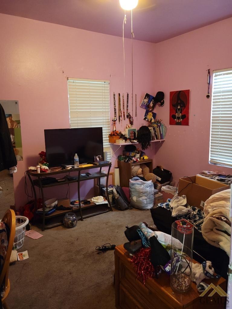 Undisclosed Address Bakersfield, CA 93305 - Photo 8 of 13 a room with gym equipment and a window