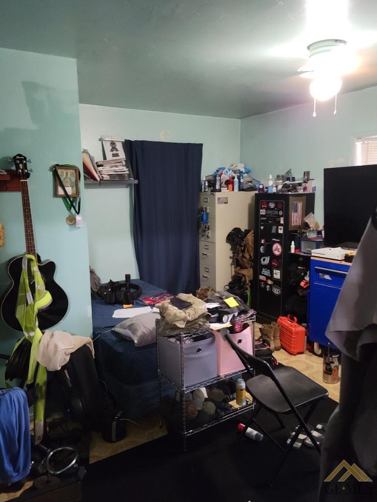 Undisclosed Address Bakersfield, CA 93305 - Photo 9 of 13 a room with gym equipment and equipment