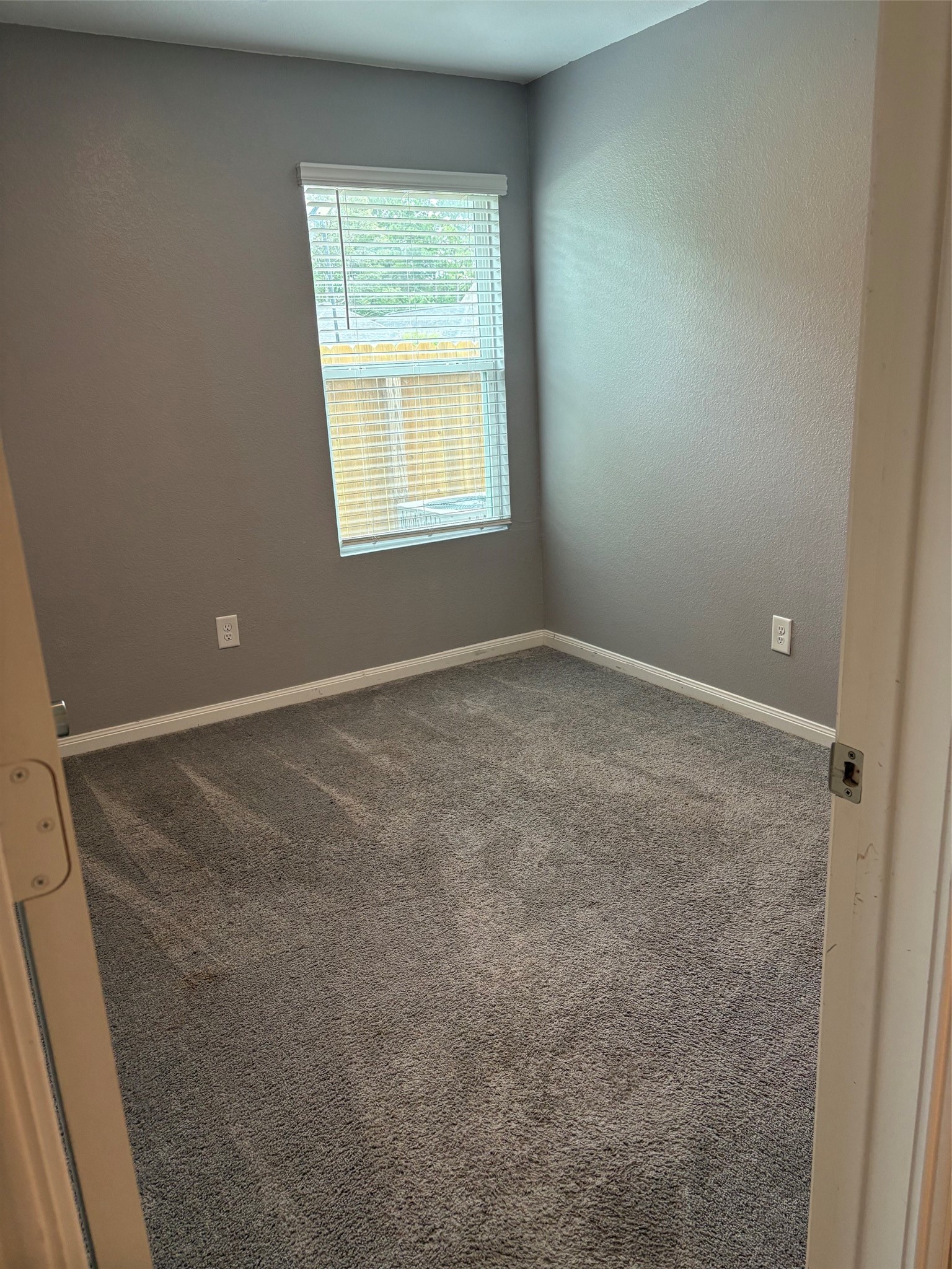9822 Emerald Stone Way Conroe, TX 77306 - Photo 8 of 12 Second Bedroom
