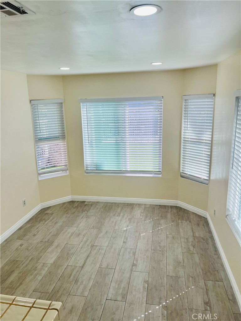 7363 Bothwell Road Reseda, CA 91335 - Photo 17 of 28 an empty room with windows