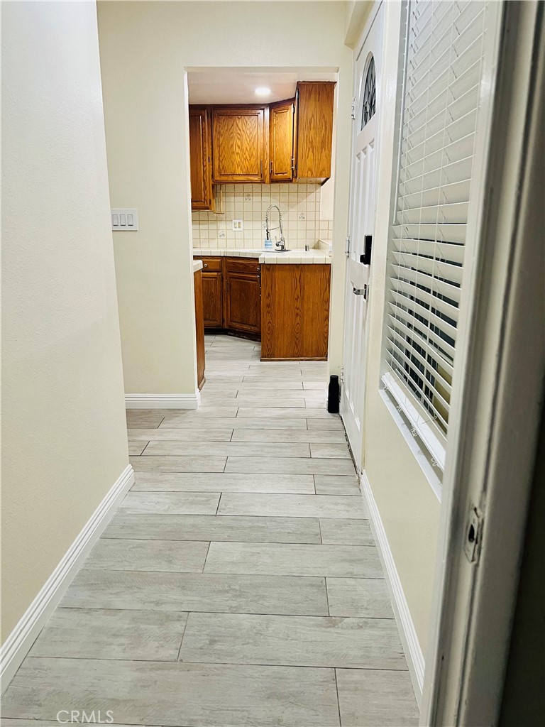7363 Bothwell Road Reseda, CA 91335 - Photo 20 of 28 a bathroom with a sink and a mirror