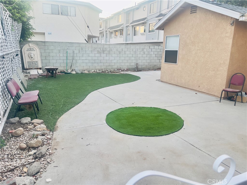 7363 Bothwell Road Reseda, CA 91335 - Photo 5 of 28 a view of a backyard with a garden and plants